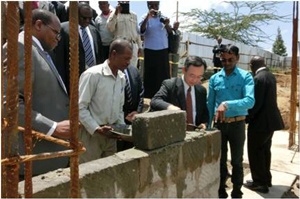 Mr. Yamada laying a foundation stone
