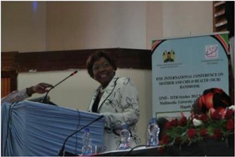 Hon. Mugo, Minister for Public Health and Sanitation, delivering her speech