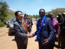 Mr. Mikio Mori, Chargés d'Affaires ad interim of  Japan to Kenya  and Hon. Ababu Namwamba, Member of Parliament, Budalangi Constituency shaking hands.