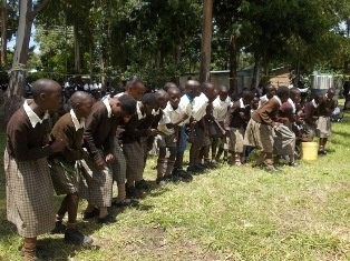 Pupils and Students of Our Lady of Peace Chebukaka Girls’ Primary/Secondary School expressing joy by singing and dancing
