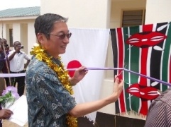 H.E. Terada  cutting the ribbon