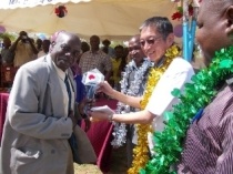 H.E. Terada handing over the key to Mr. Onesmus Kambi, the Chairman of School Management Committee