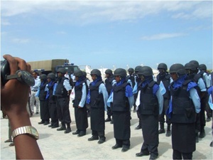 Police Officers wearing Donated Helmets and Flack Jacket
