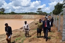 Ambassador receiving a brief tour of the project site