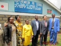 Mr. Mori and Officials in front of Kapchemosin Primary School