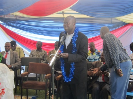 Fr. Sabatia, Vice  General, representing Bishop of Kakamega Diocese giving a speech
