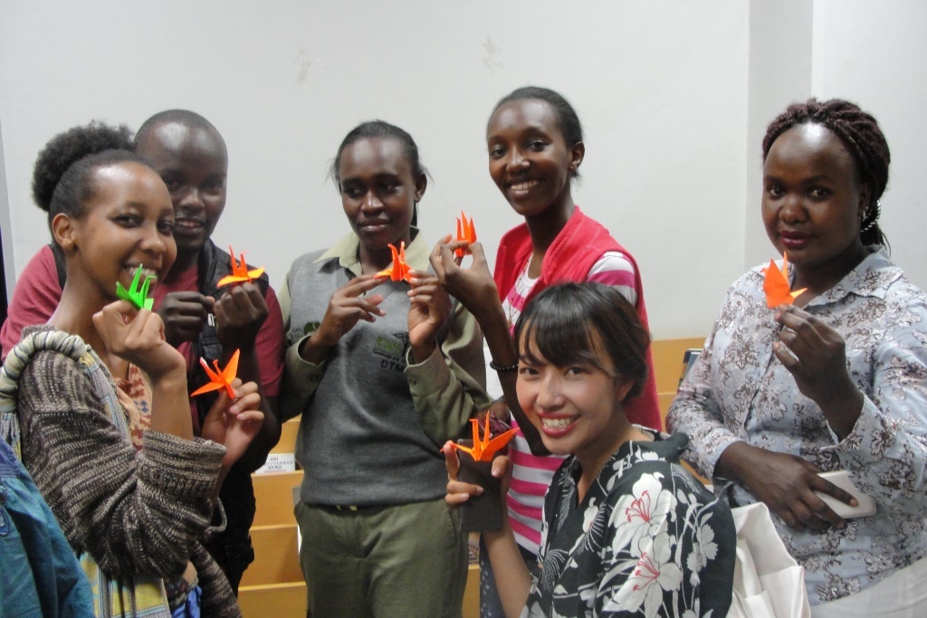 A group displays their origami cranes
