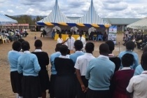 Students explaining through a play on how the school used to be before receiving the GGP fund