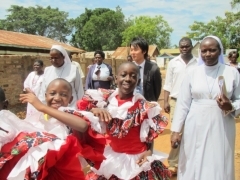 Mr. Ishikawa touring the school with Sisters and pupils