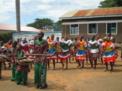 Pupils expressing their joy by dance and song