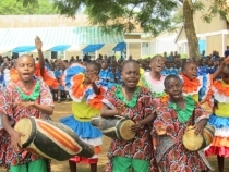 Pupils expressing their joy by dance and song