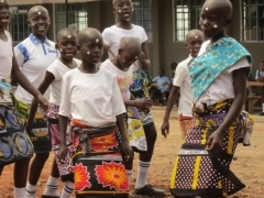 Female pupils expressing their joy by dancing