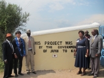 Mr. Machida and the School Representatives in front of the new school gate