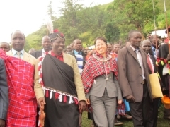 Ms. Takashima touring the school with County officials