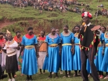 Community people expressing their joy by dance and song