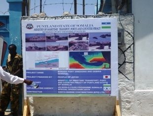 A sign board that shows Japan’s assistance placed I n front of the Puntland’s Ministry of Marin Transport, Ports & Counter Piracy at the Bossaso port