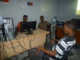 Hargeysa Migrants Response Centre. A migrant is being registered.